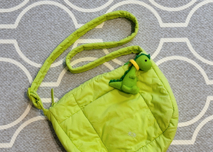Benita's crochet dinosaur on a neon tote | Bag charms in Singapore