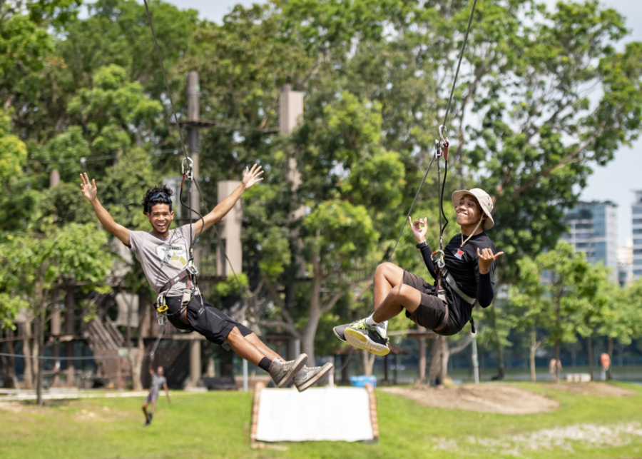 Two men having a fun time at Forest Adventure | SG60 deals and promotions