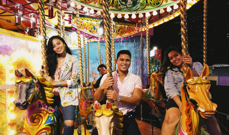 Our Honeycombers HQ team, reliving their childhood days on the Gallopers.