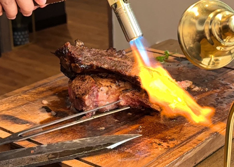 Tomahawk contemporary steakhouse steak grilled