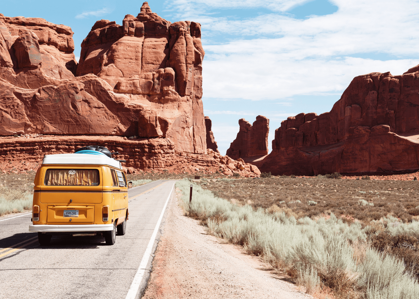 yellow volkswagen on road
