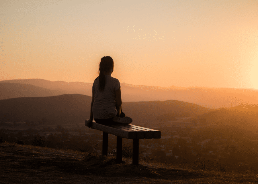 woman gazing at sunset | meditation