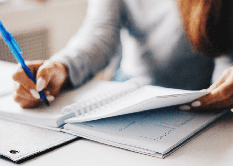 2023 habits | woman writing in notebook