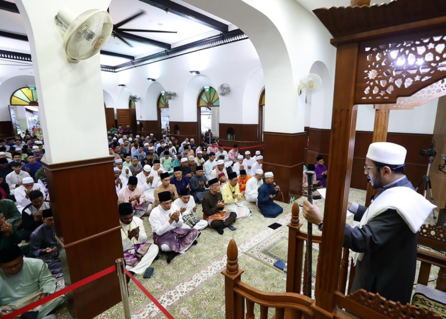 Hari Raya congregration praying at the mosque