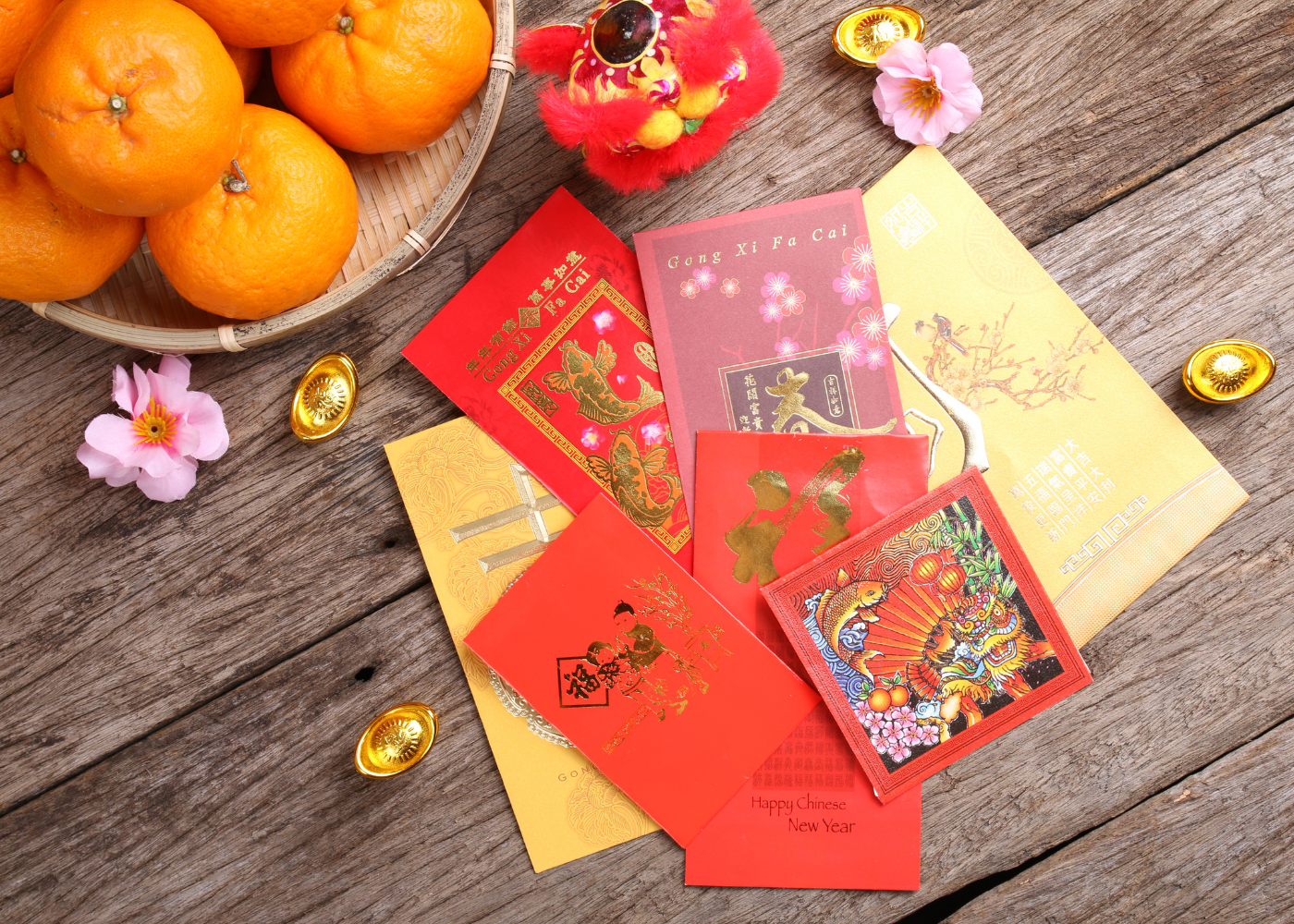 cny ang bao rates singapore | red packets on table
