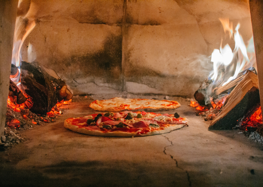 date ideas singapore | making pizza in wood fired oven
