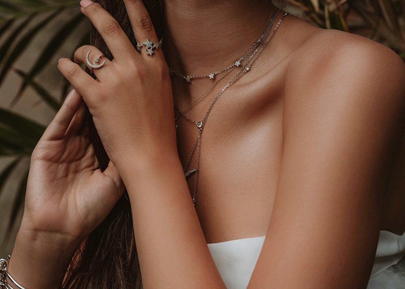 Best minimalist jewellery brands in Singapore - Woman wearing silver jewellery pieces