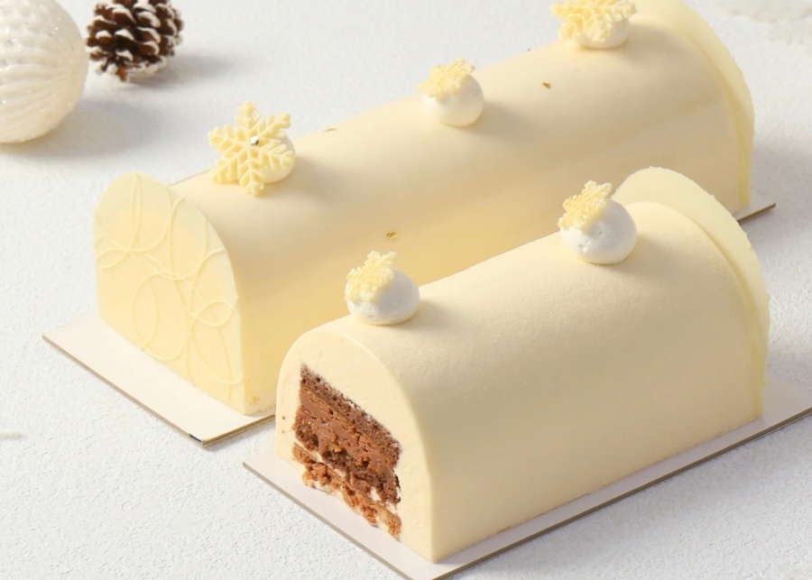Best Christmas log cakes 2025 in Singapore - Patisserie Cle hazelnut praline log cake