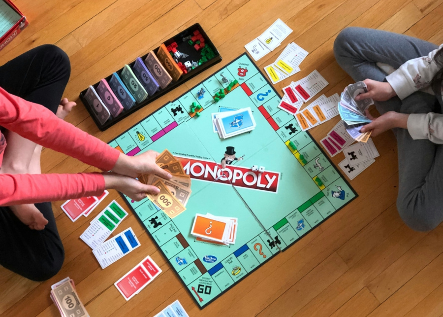 Best team building activities in Singapore - Top-down view of a Monopoly board game