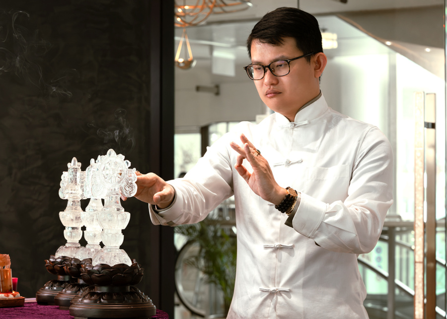 Best fortune tellers in Singapore - Imperial Harvest Grand Master David Goh conducting an audit