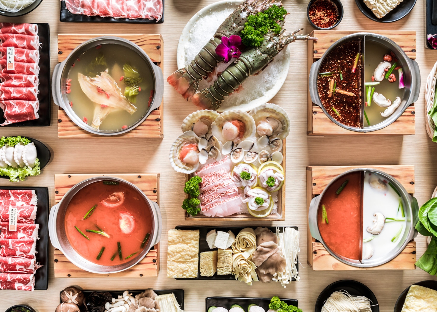 Best steamboat restaurants in Singapore - City Hot Pot top-down view of hotpot spread