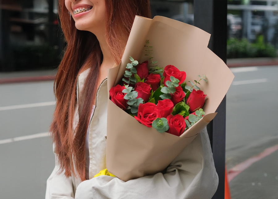 Best florist stores in Singapore - Potico woman holding a bouquet of roses