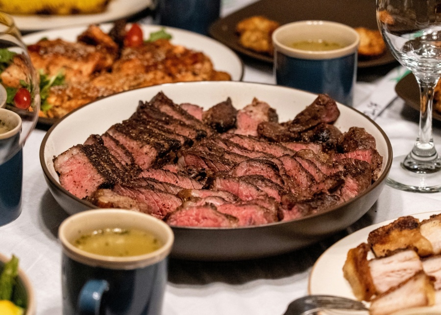 Best steak restaurants in Singapore - Sliced New York strip steak on a dinner table