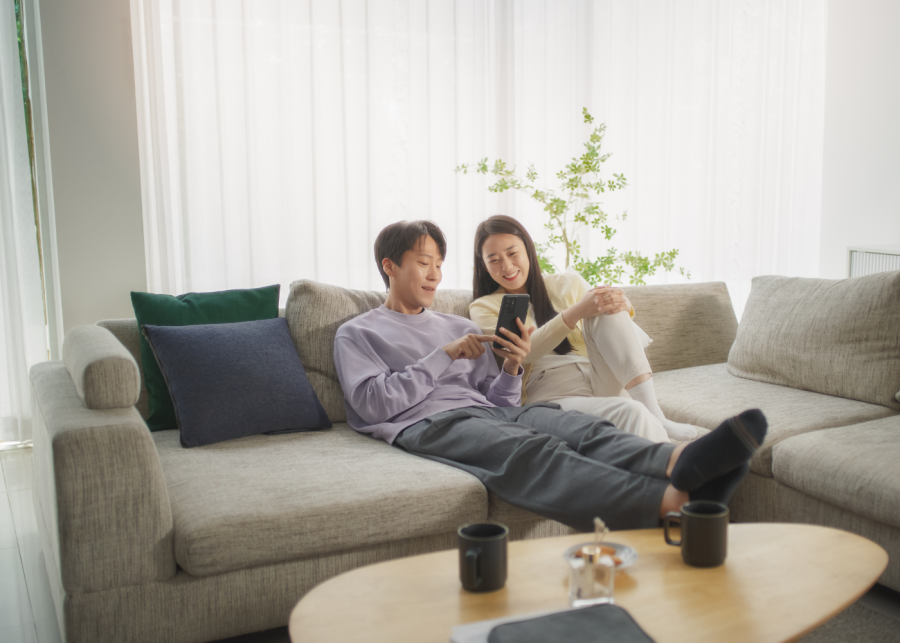 asian couple on the couch