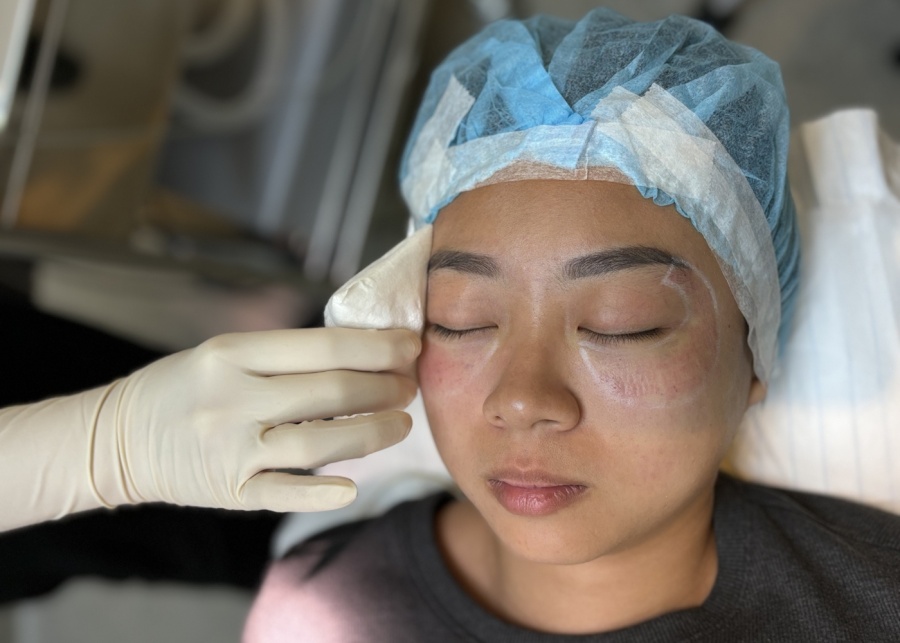 Cambridge Medical Group - Staff applying cold compress