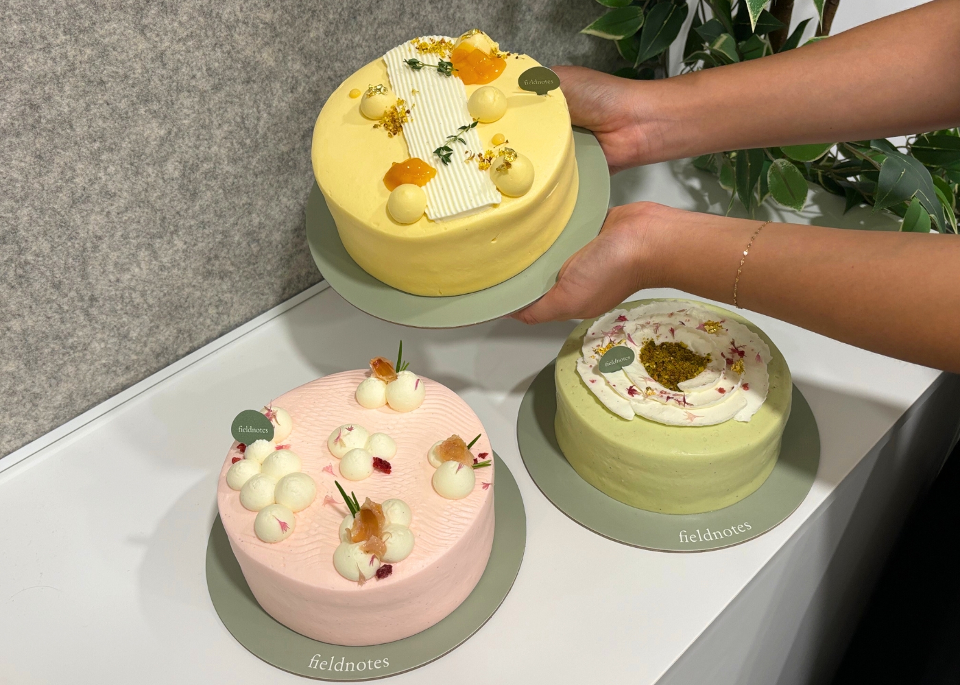 Best birthday cakes in Singapore - Fieldnotes mango yuzu cake, lychee strawberry rose cake, pistachio praline cake
