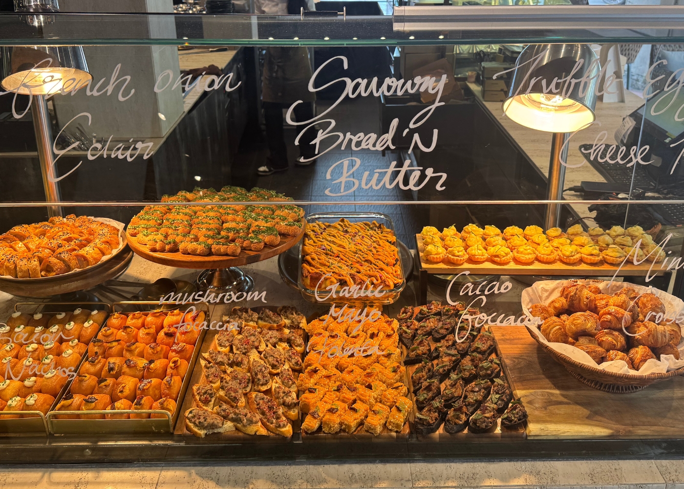 Best buffets in Singapore - Awfully Chocolate Bakery & Cafe glass display of pastries