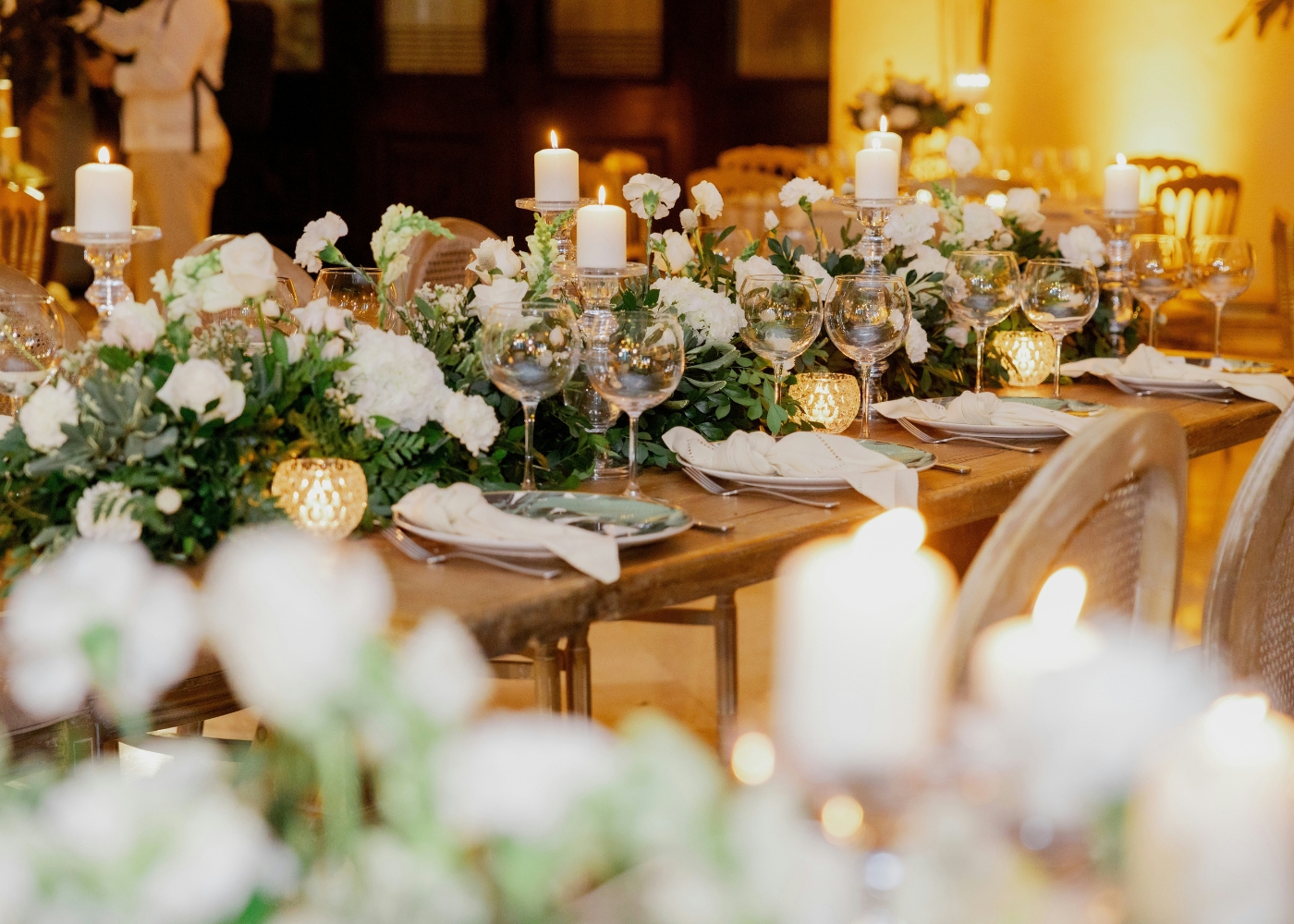 Best wedding venues in Singapore - Indoor seats for a rustic themed wedding with wooden furnishing and fresh flowers