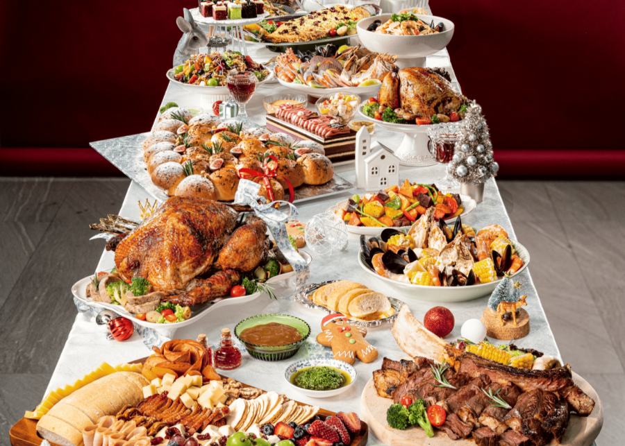 Best Christmas takeaway spots in Singapore - Deli Hub Catering festive spread with turkey, holiday classics and log cakes