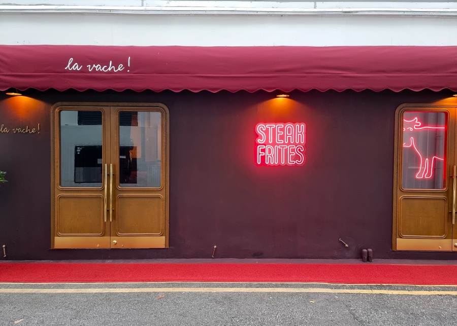 The vibey neon entrance | La Vache! Singapore restaurant review