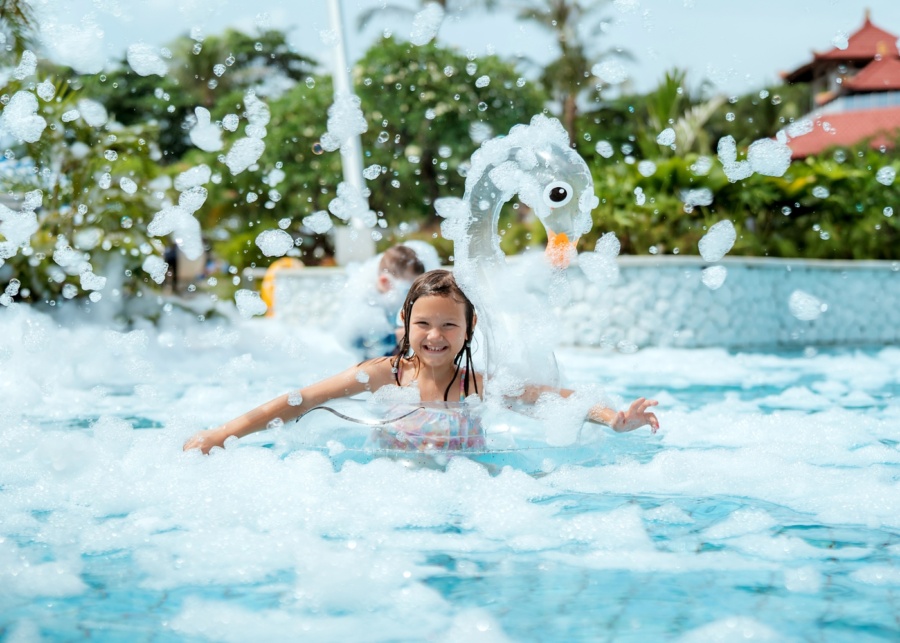 Best luxury resorts in Bali - Holiday Inn Resort Baruna Bali - Child in swimming pool