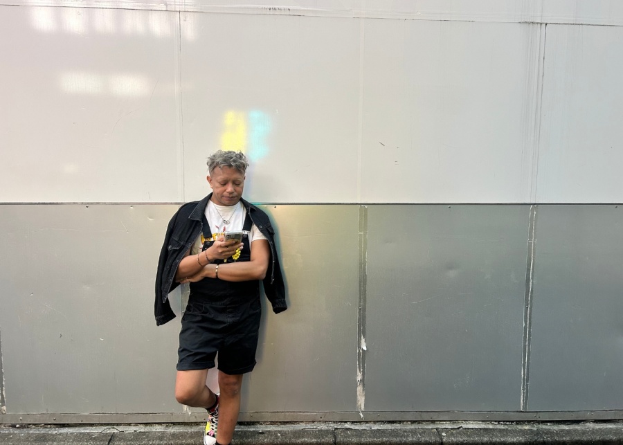 Ubigi eSIM review - Tokyo, Japan - Sufyan checking his phone