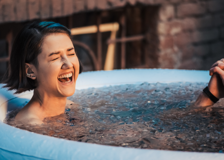 cold plunge benefits woman in ice bath