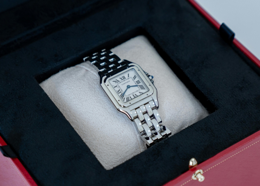 Self-care gifts - A close-up of a Cartier watch in a gift box