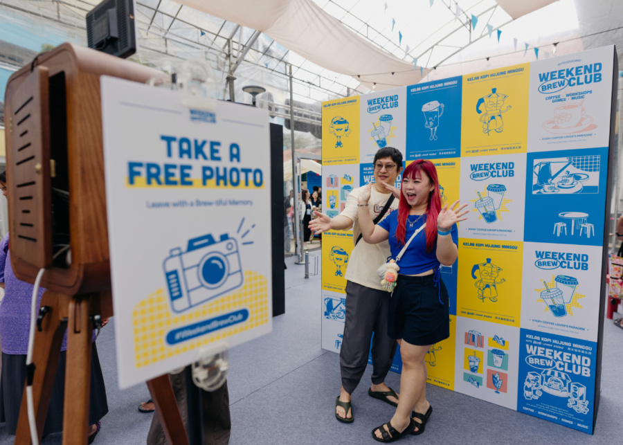 Participants taking photos at the photo booth | Weekend Brew Club in Singapore
