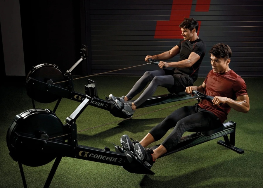 Best Hyrox training gyms in Singapore - Fitness First members on rower machine
