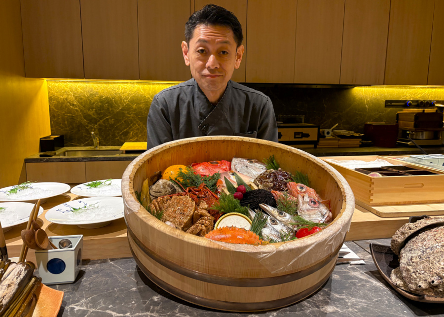 Jiin Omakase's chef Matsuda with the seafood ingredients of the day