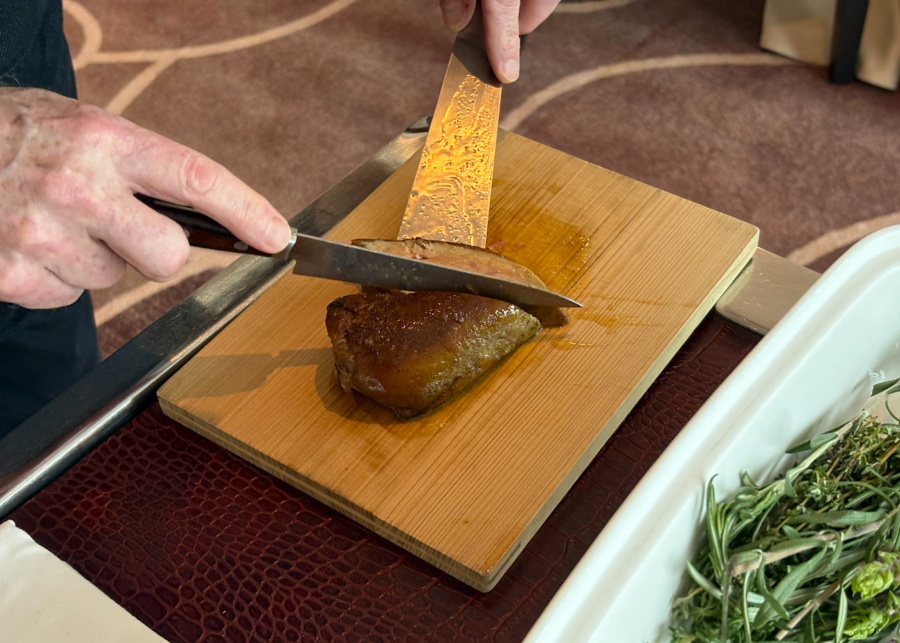Chef Emmanuel Stroobant slicing the pan-fried foie gras tableside | Saint Pierre restaurant in Singapore review