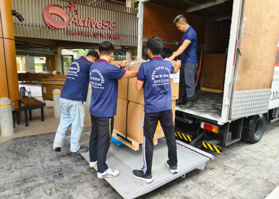 Best office movers in Singapore - Move Move Movers staff transporting items out of a lorry