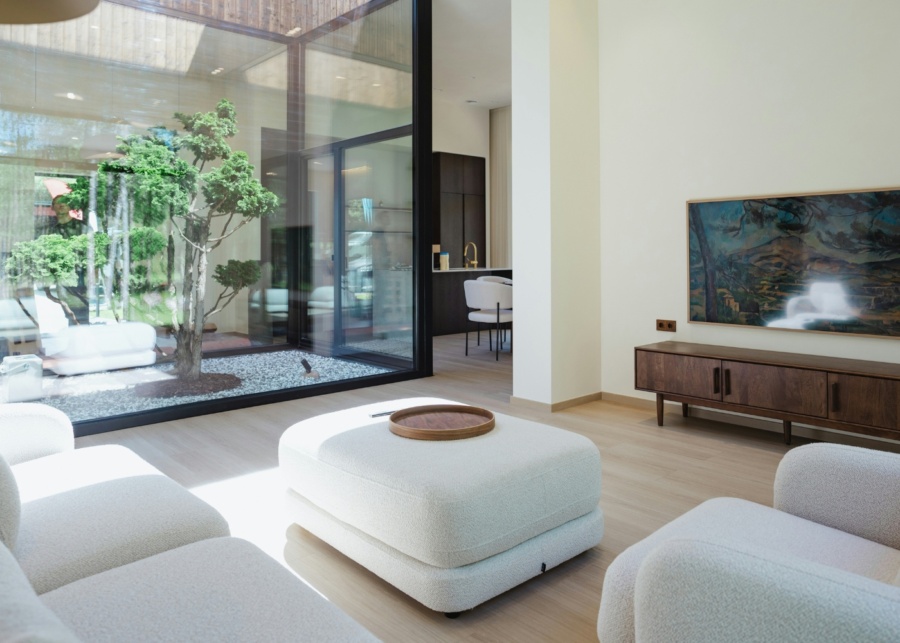 Recommended feng shui masters in Singapore - A sun-lit living room with a courtyard