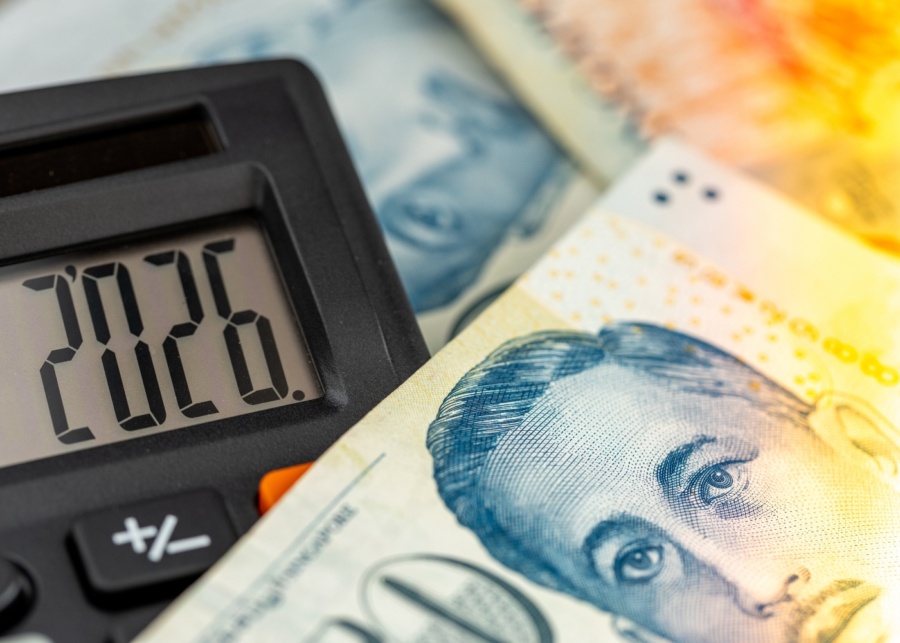 USmart budgeting hacks - Close-up of cash and calculator