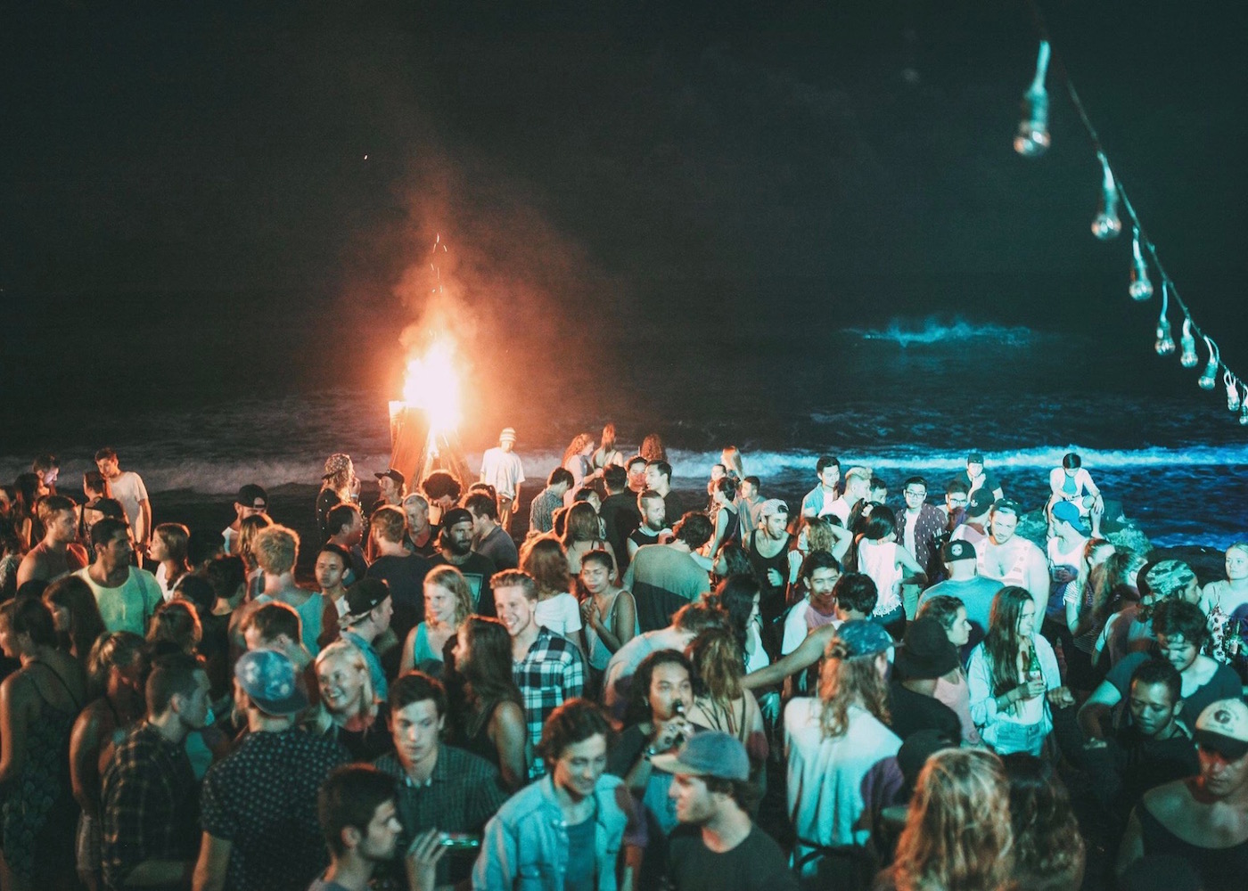 Nighttime beach party at Sand Bar in Canggu, Bali, Indonesia