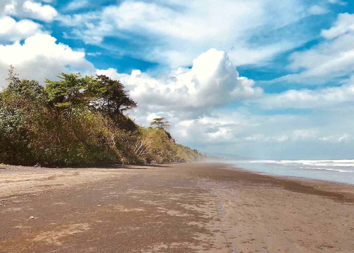 Black sands of Medewi Beach on the west coast of Bali