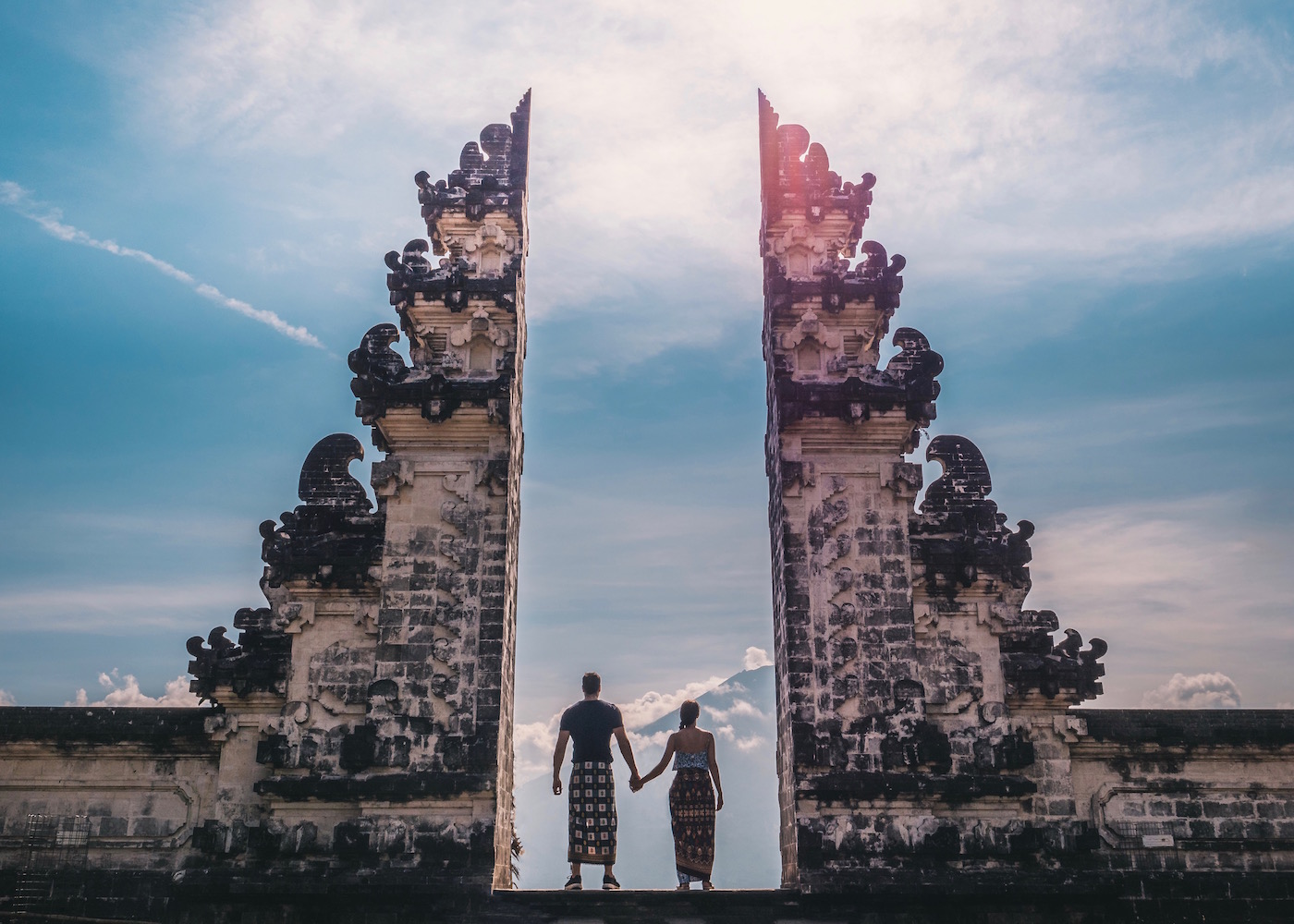 Couple standing inside Pura Lempuyang temple AKA 