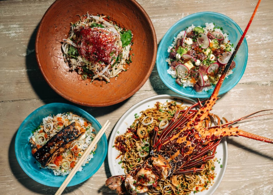 Fresh salad, grilled seafood and signature food menu at Sundays Beach Club in Uluwatu, Bali, Indonesia