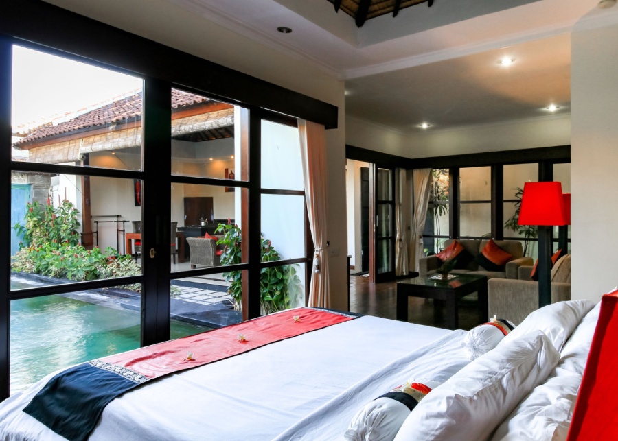 The bedroom overlooking the private pool at Aleesha Villas in Sanur, Bali, Indonesia