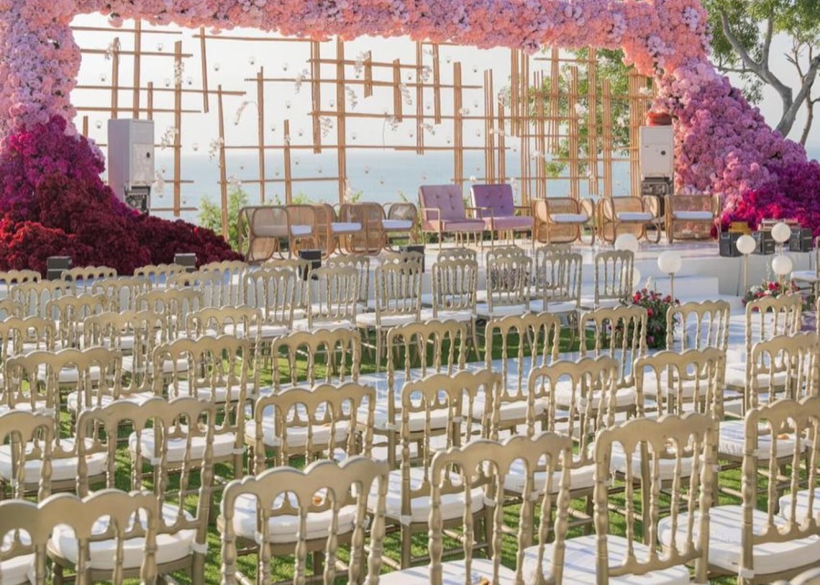 The rows of wooden chairs set up by Bali Sewa Sewa for an outdoor wedding ceremony in Bali Indonesia