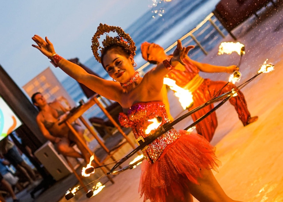 Fire dancers at White Rock Beach Club in Ungasan, Bali, Indonesia