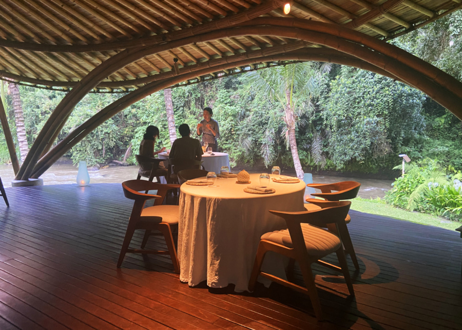 Couple dining at Kubu restaurant in Ubud, Bali - Mandapa Ritz Carlton Reserve
