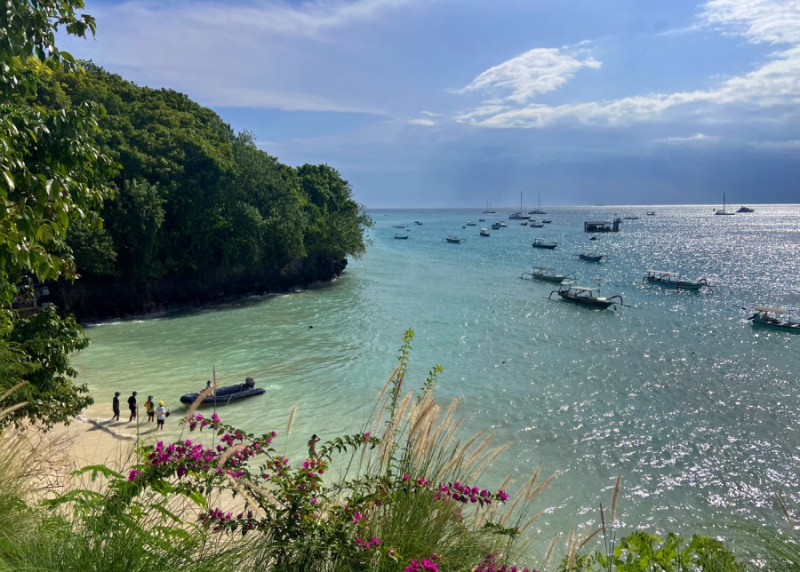 Boats coming to the shores on a beach in Nusa Lembongan, Bali, Indonesia