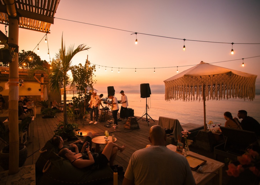 Sunset session with live band with ocean backdrop at Penida Colada Beach Bar and Restaurant