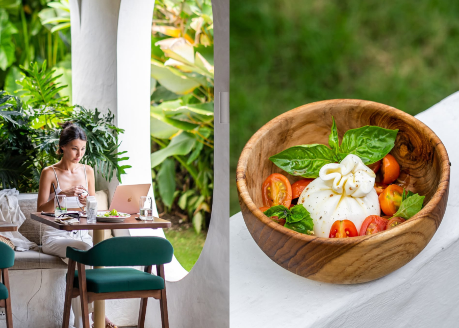 Fresh burrata salad with cherry tomatoes and basil served in a wooden bowl at 12 Urban Cafe Canggu.