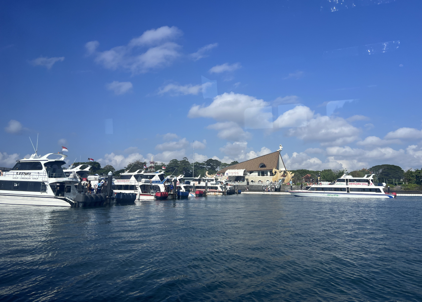 Docked boats at Sanur Harbour - how to travel by boats in Bali, Indonesia