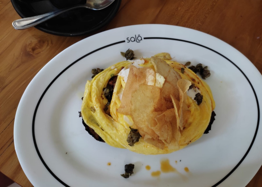 Coffee and chilli scrambled eggs for brunch at Sala Bistro cafe in Sanur, Bali