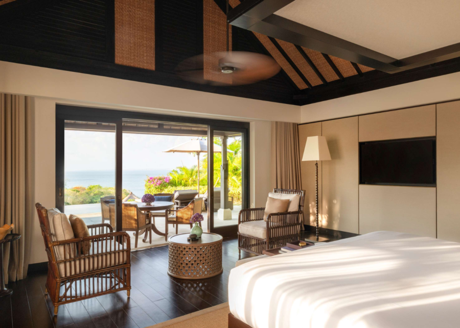 Luxury ocean-view pool villa bedroom at Raffles Bali resort in Jimbaran with private terrace and ocean views.