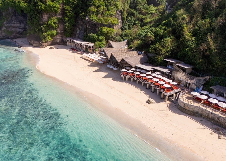 Aerial view of the ocean and Sundays Beach Club at The Ungasan resort in Uluwatu, Bali, Indonesia